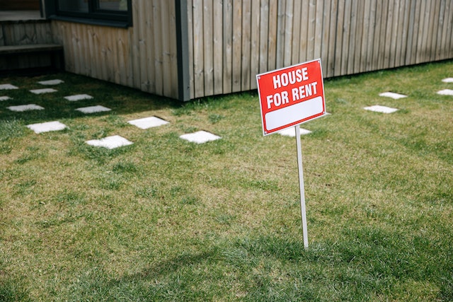 a%20red%20yard%20sign%20indicating%20a%20home%20for%20rent